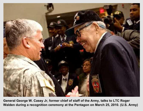 General George W. Casey Jr, former chief of staff of the Army, talks to LTC Roger Walden during a recognition ceremony at the Pentagon on March 25, 2010. (U.S. Army)